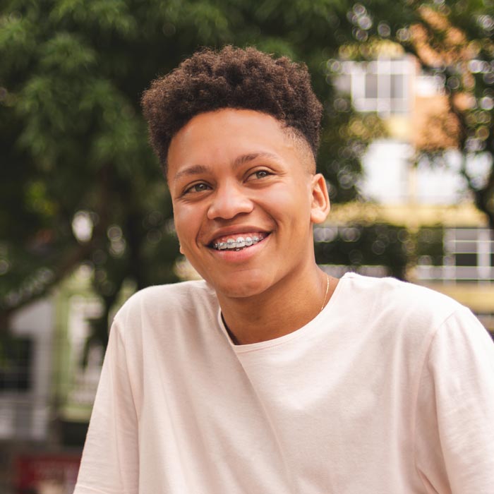 smiling teenager with braces